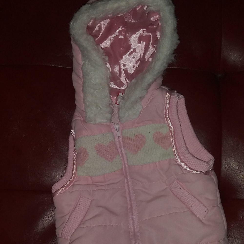 Pink vest.
